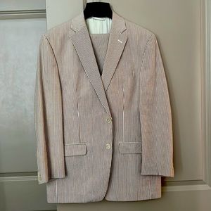 Nothing says day-wedding like a seersucker suit from Lauren.   This is in beige.